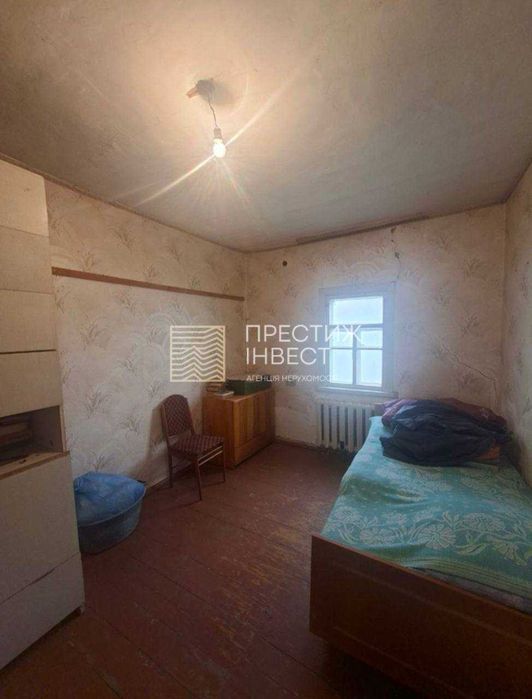 Продаж половини будинку на 5 сотках землі