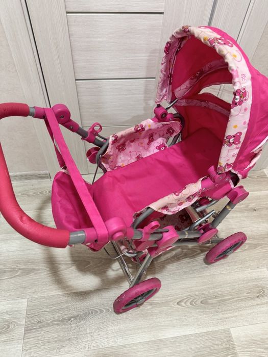 Игрушечная коляска