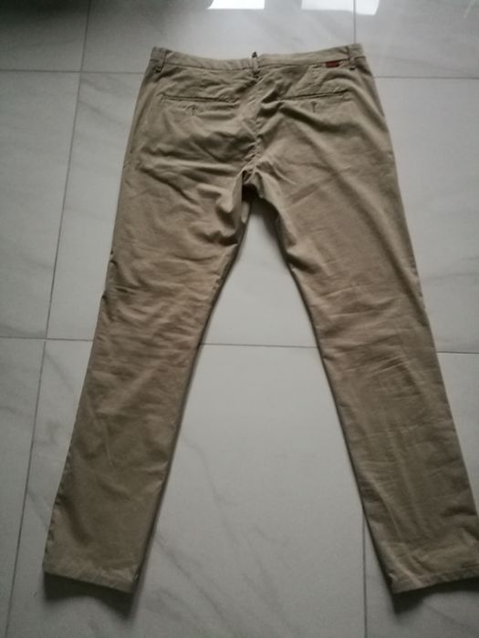 Spodnie Indywidual rozmiar 36W-32L, 97% bawełna. Slim fit.