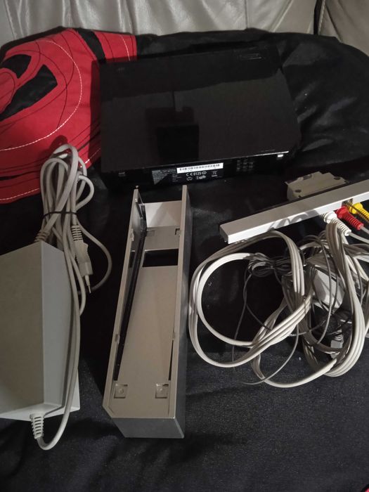 Consola nintendo Wii com quatro comandos, não respondo a SMS.