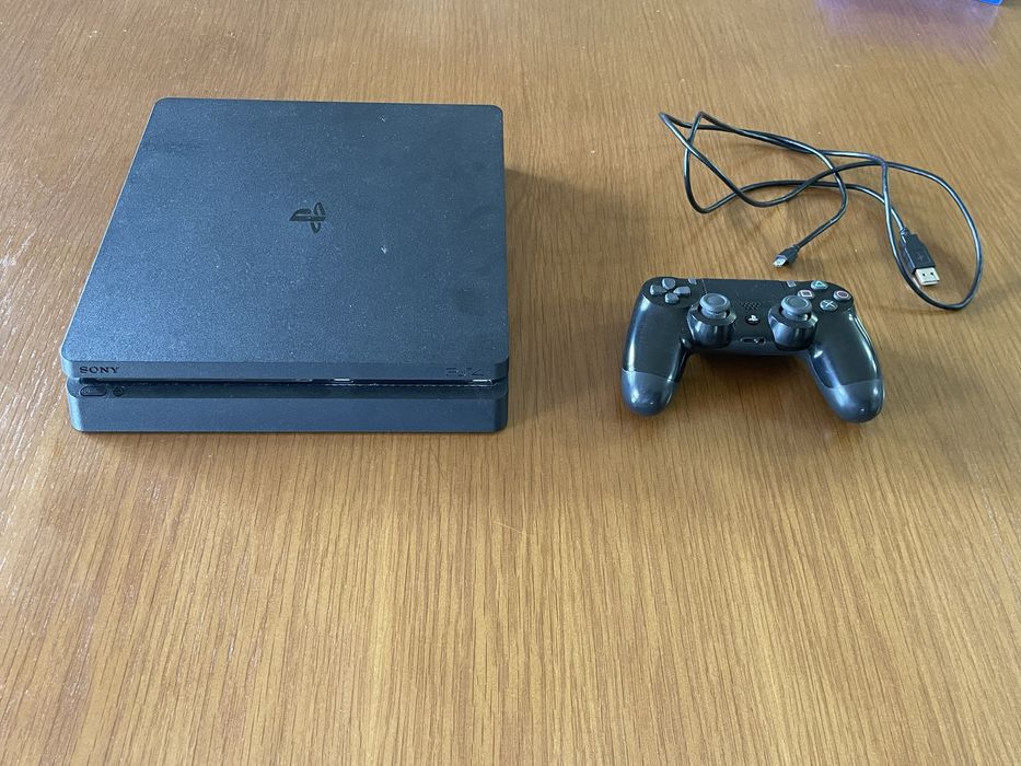 Ps4 slim 500GB usada com caixa + 4 jogos