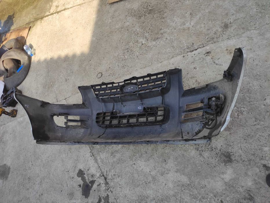 Передній бампер kia Sportage 2 04-08р  865111F050 бампер Кіа спортедж