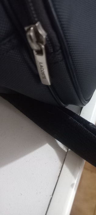 Vendo mochila da lacoste poucas vezes usada