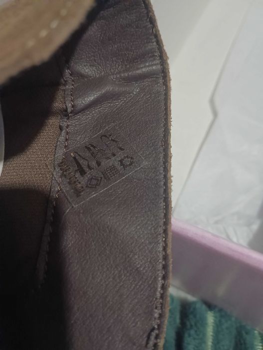 Botas cano alto camurça nunca usadas.