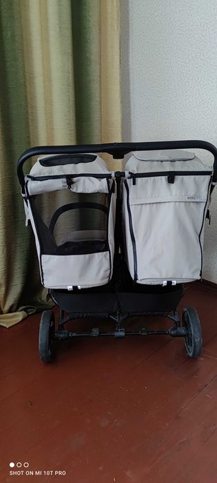 Коляска для двійні