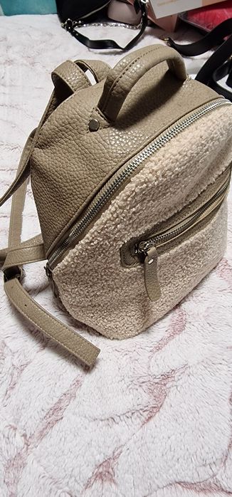 Mochila + porta moedas