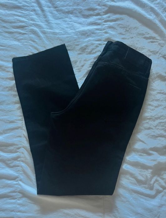 Calças ganga preta com etiqueta