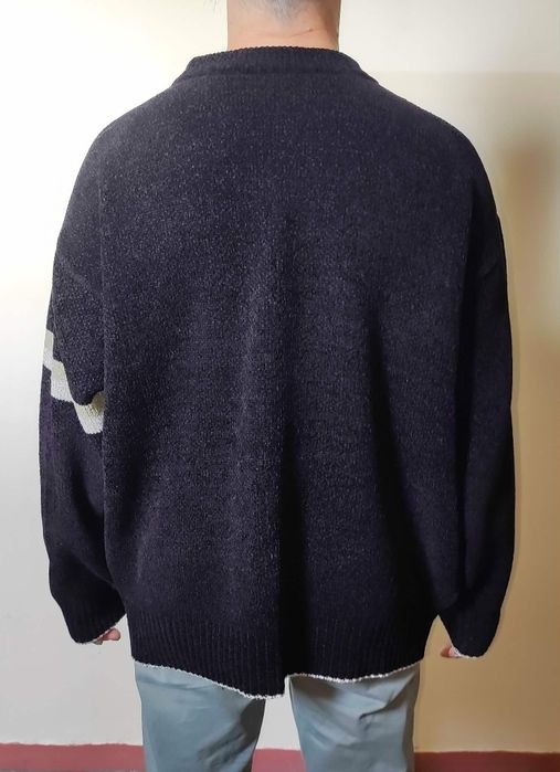 Elegancki sweter boucle.
