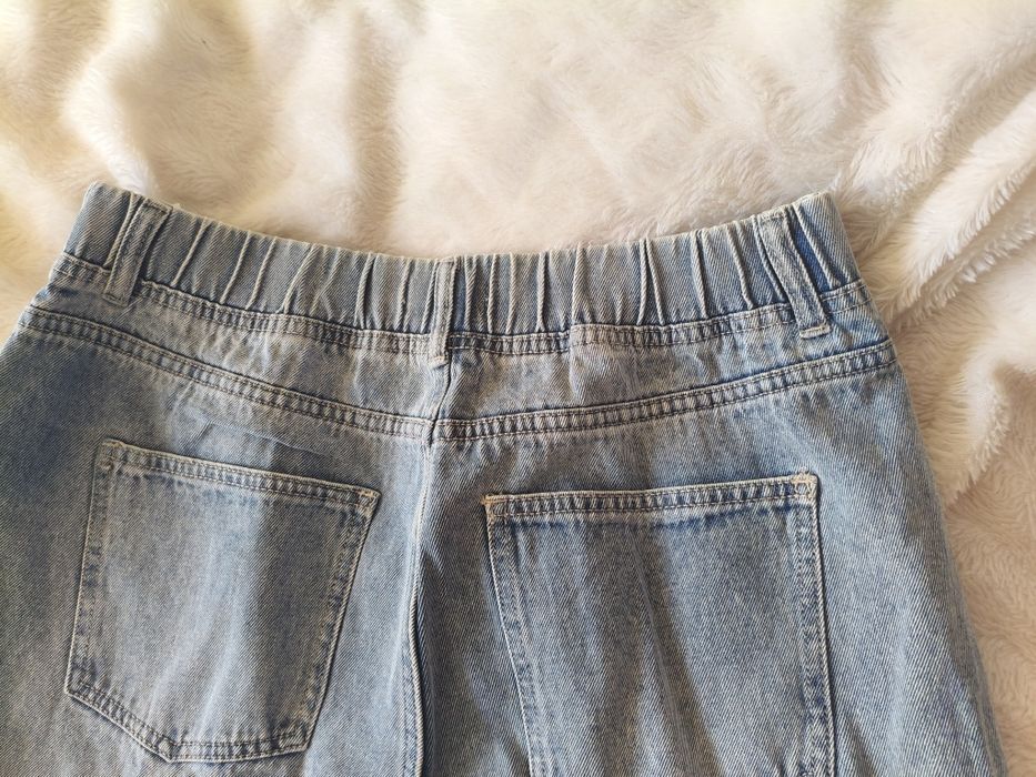 Spodnie jeansy nowe bez metki Sinsay M/L.