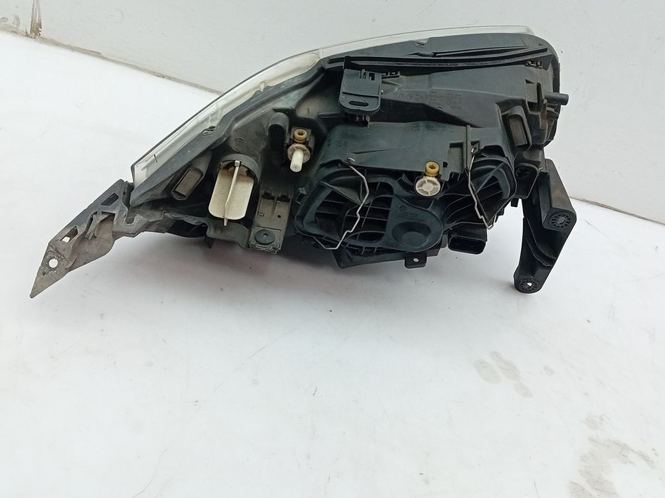Ótica / farol esquerda BMW 1 (E87)