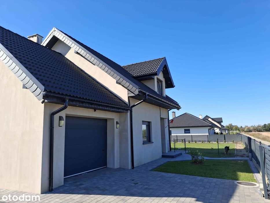 Nowoczesny dom z 5 pokojami i garażem