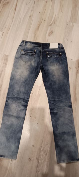 Spodnie jeans 40