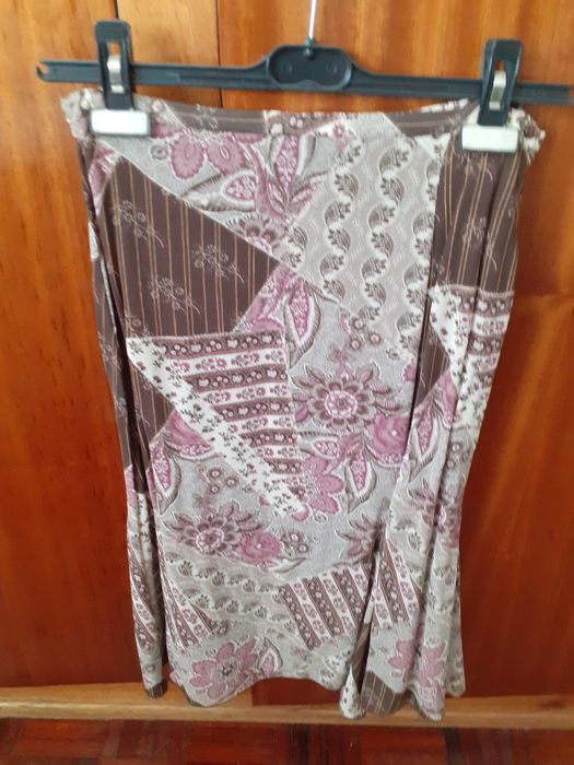 Roupa em óptimo estado de marca