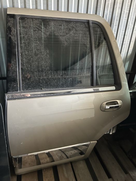 Lincoln Navigator 3 drzwi lewy tyl