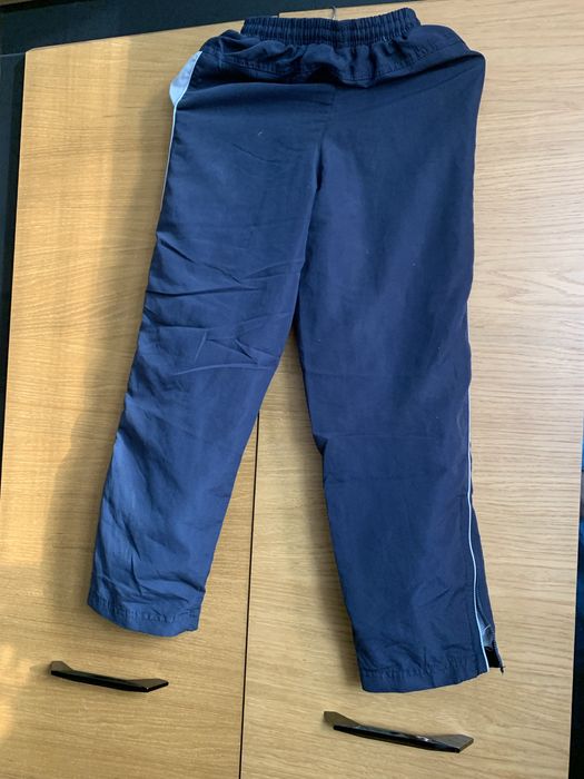 Spodnie z rozpinanymi u dołu nogawkami  7-8 lat