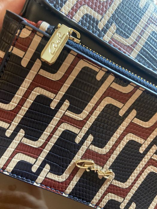 Mala tira colo casual .