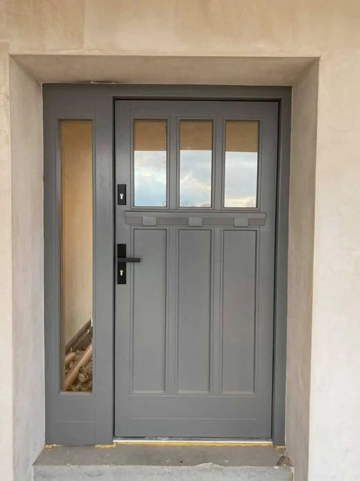 Drzwi zewnętrzne drewniane z montażem producent