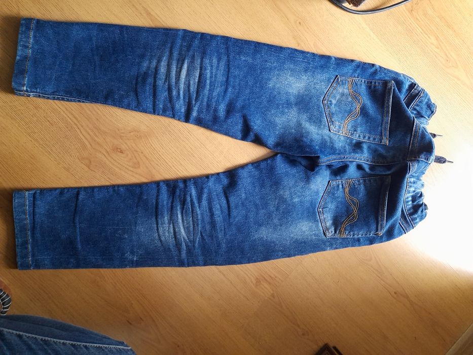 Spodnie jeans  r134