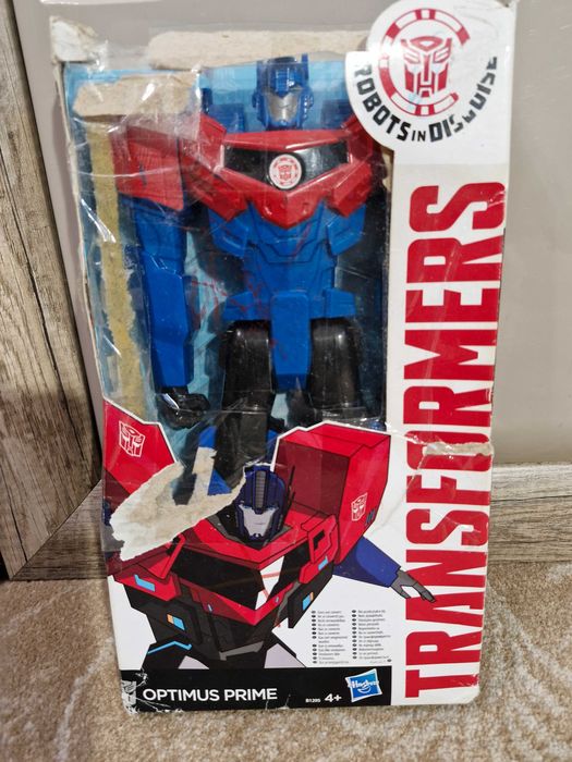 Трансформер Optimus Prime, Титани