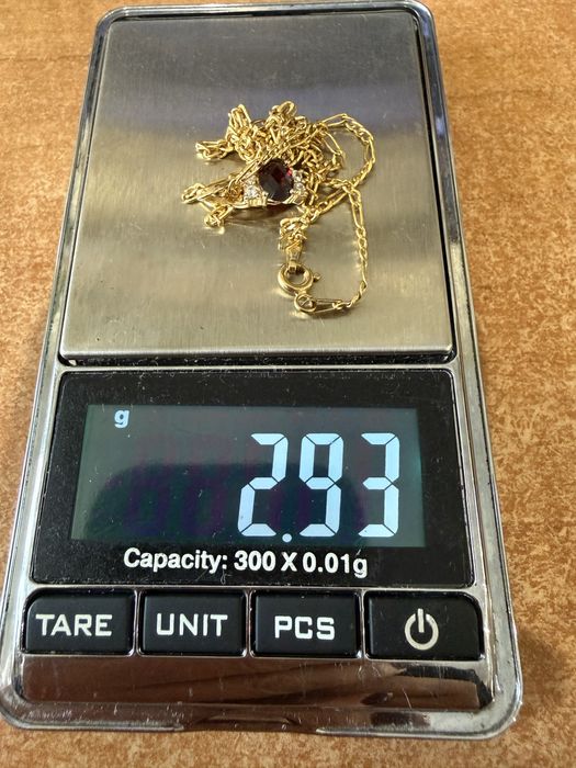 Золотий набір з гранатами