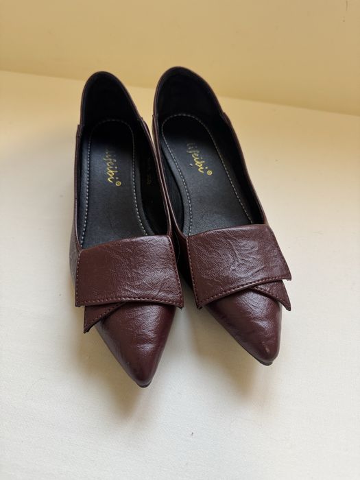 Sapatos em pele
