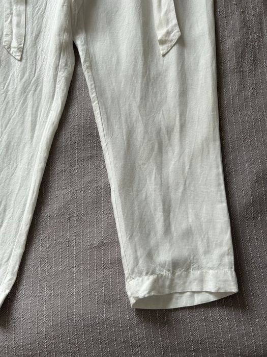 Białe lniane długie spodnie z wysokim stanem C&A 42