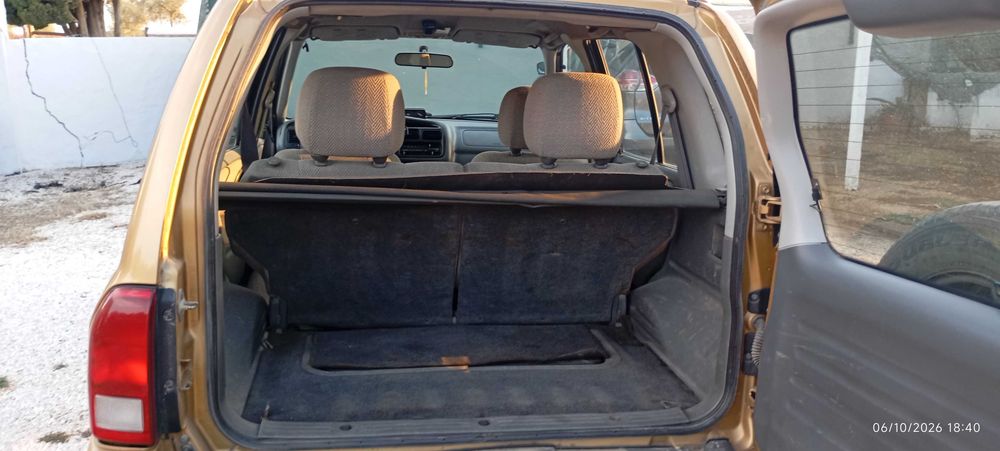 Vendo ou troco Suzuki grand Vitara por carro ou jippe automático foto 4