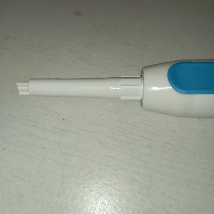 Escova de dentes a pilha, Colgate.