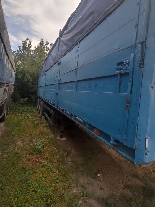 Напівпричіп бортовий тентований зерновоз