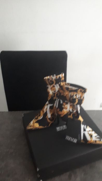 Botas originais como novas