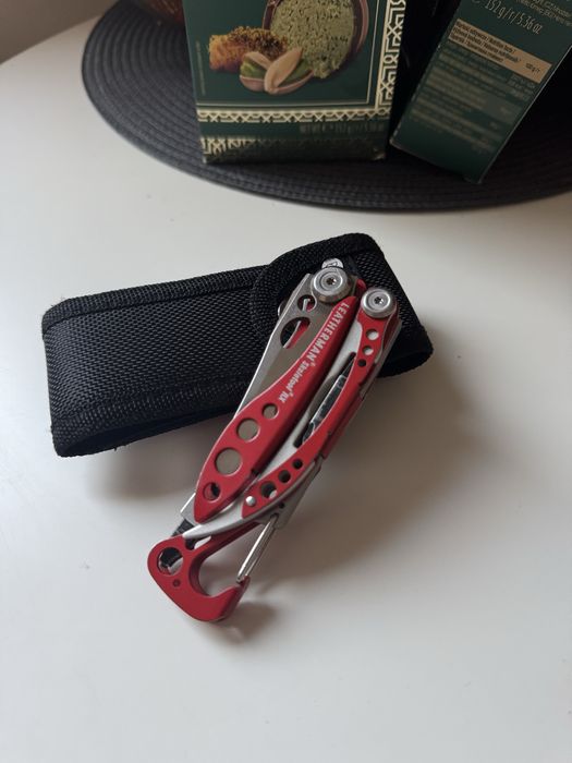 Leatherman Skeletool RX + bit do bicia szyb + kabura