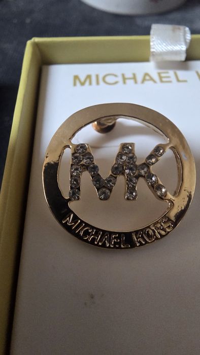 Brincos michael kors