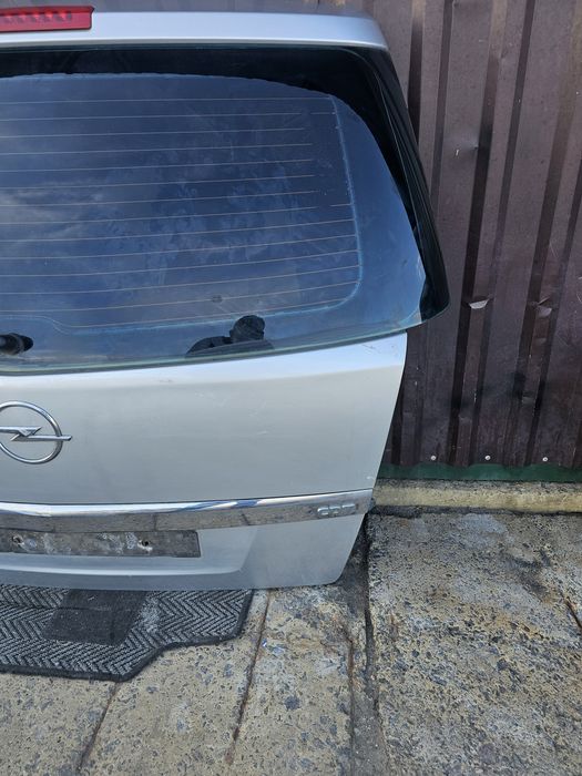 Кришка багажника Opel Zafira b кляпа Ляда замок скло Зафіра Зафира
