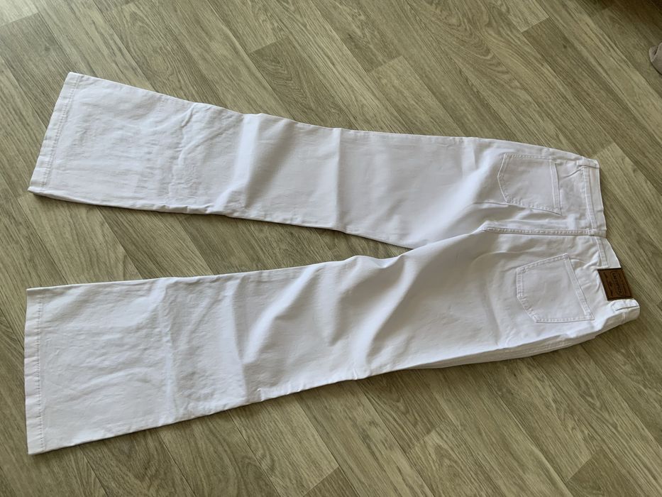 Продам білі джинси