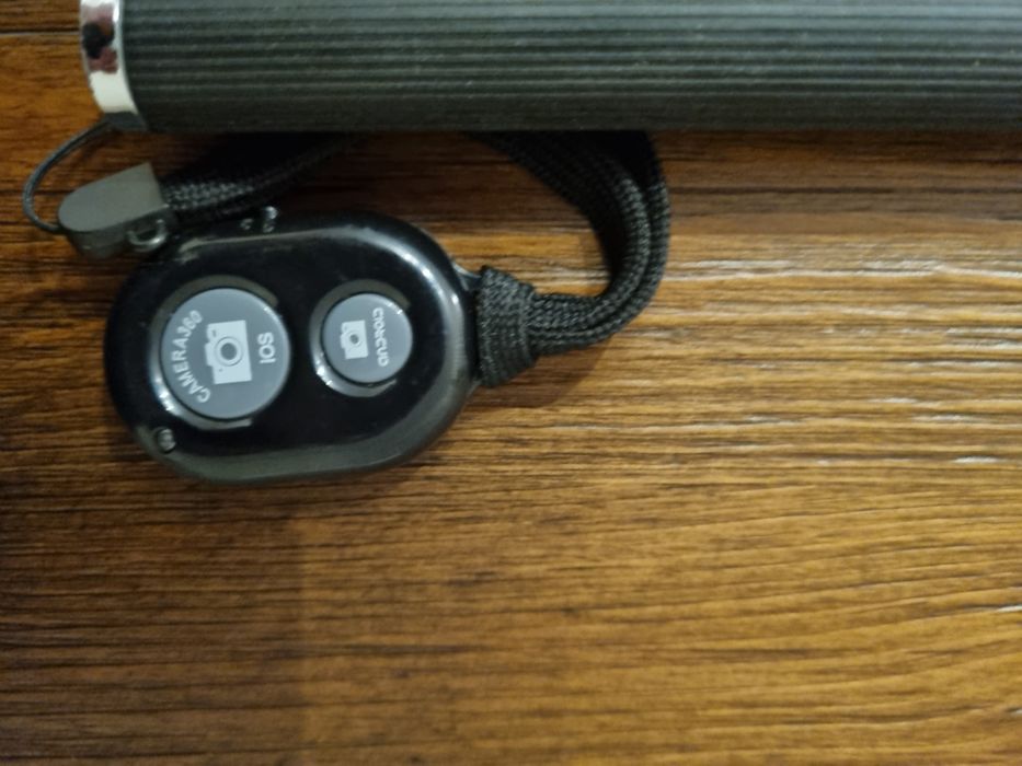 Selfie stick com remote shutter