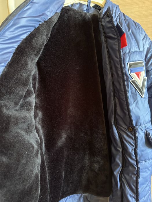 Зимова куртка подовжена