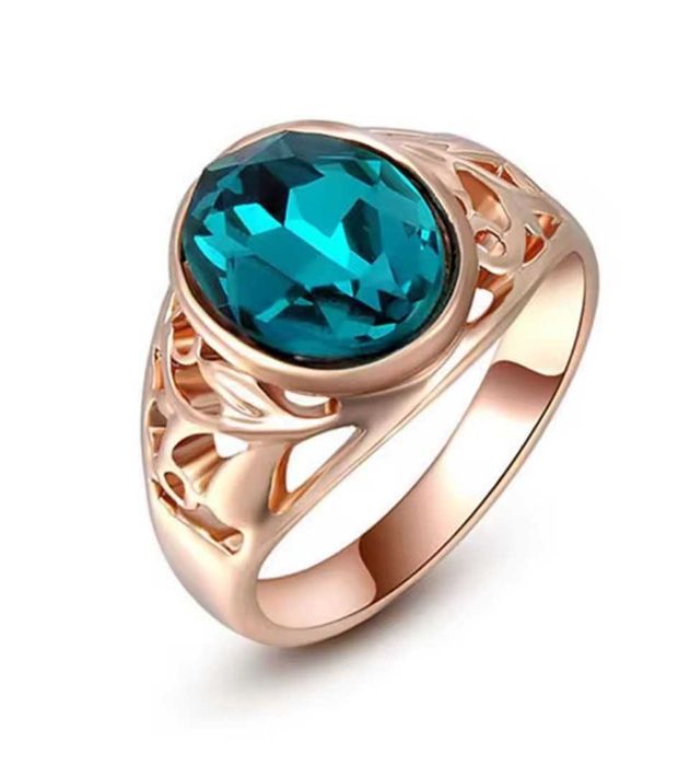 Śliczny pierścionek z niebieskim oczkiem rozm. 7