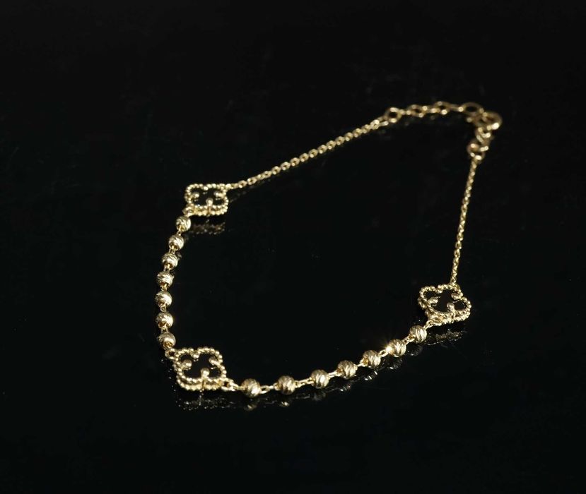 Złoto 585 - złota bransoletka z koniczynkami