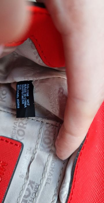 Skórzana torebka listonoszka oryginalna Michael Kors