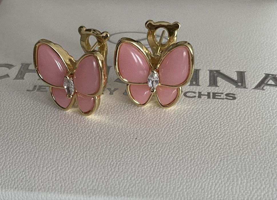 Модные женские серьги  Cartier