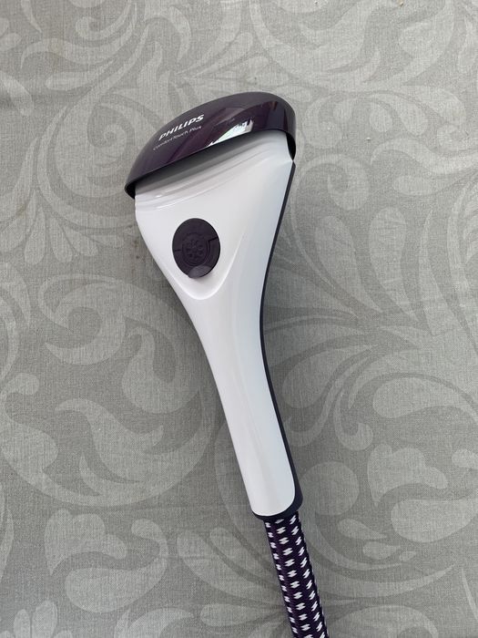 Ferro de engomar vertical Philips ConfortTouch Plus 558/30