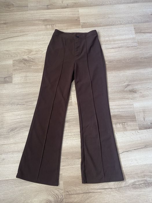 Damskie brązowe eleganckie spodnie XS dzwony