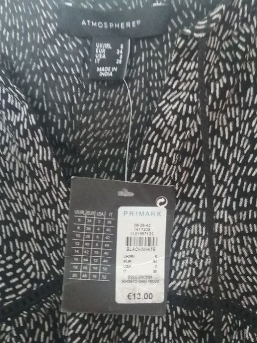 Blusa preta e branca nova