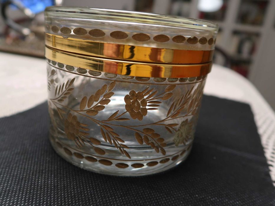 Beautiful glass box with lid, featuring low-relief and gold accents.