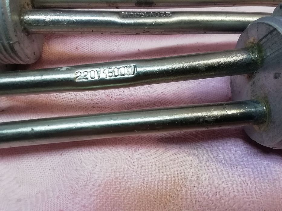 Grzałka elektryczna 220v 1500wat, nowa.