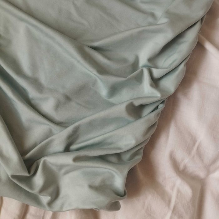 Сексі блакитна сукня з вирізом та зав'язками на шиї