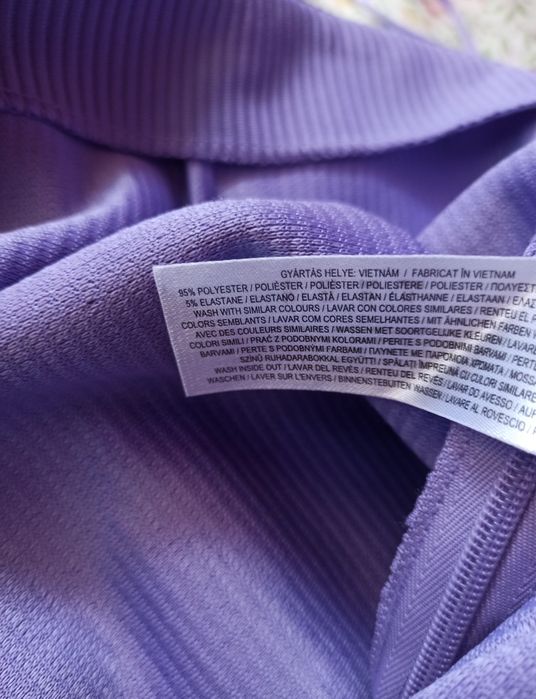 Materiałowe spodnie damskie z szeroką nogawką  42
