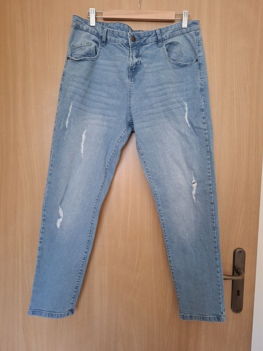 Spodnie jeansowe rozm. 44 z dziurami