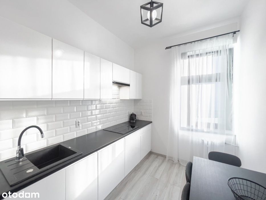 Przestronny Apartament z 2 Sypialniami i Balkonem