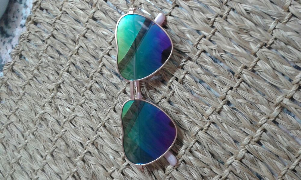 Óculos de sol em formato de coração